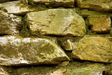The old masonry stone and wooden blocks