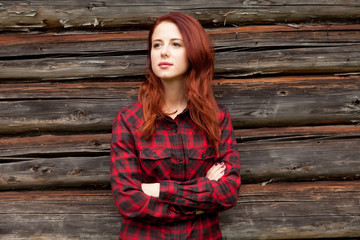 Portrait of a redhead woomen in tartan