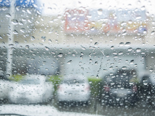 Obraz na płótnie Canvas Rain drop on windshield