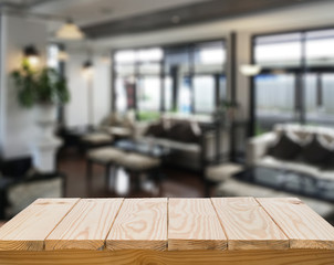 Wood table top with blur interior background