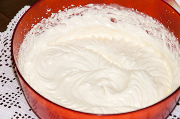 Preparing homemade ice cream in the bowl
