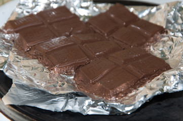 Melting cooking chocolate on the paper