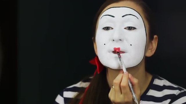 Portrait of the girl mime, which causes his stage makeup