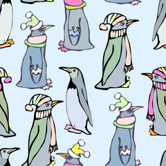 Christmas penguins in scarves and hats seamless pattern.Vector