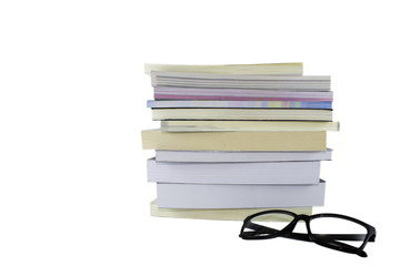 Black glasses and books