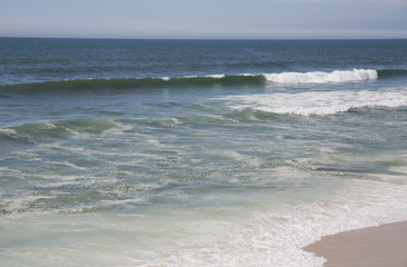 Wave of the sea on the sand beach
