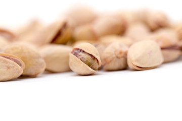 pistachios on a white background. close