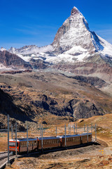 Matterhorn peak with a train in Switzerland 