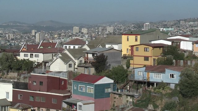 Vertical pan of the colorful houses of Valparaiso, Chile.