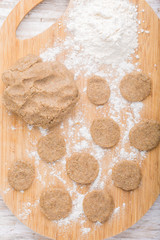 Preparing homemade cookies on the kitchen board