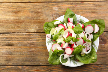 Fresh vegetable salad on table close up