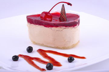 pastry at white plate with decoration
