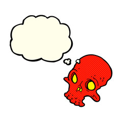 cartoon spooky skull with thought bubble
