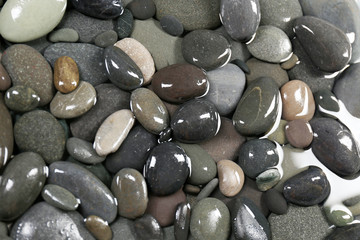 Fototapeta na wymiar Gray sea pebbles background