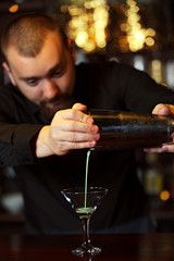 Bartender making cocktail