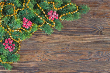 Christmas fir tree with decoration wooden background
