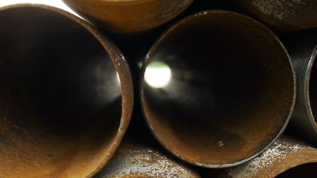 Corroded casing pipes close up