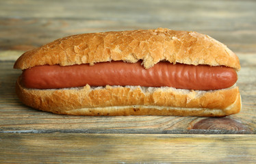 Hot dog on wooden background