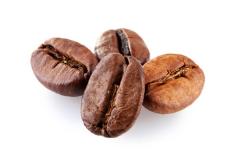 Brown coffee beans isolated on white