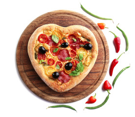 Heart shaped pizza on cutting board isolated on white