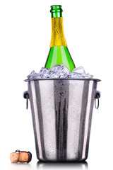 Bottle of champagne in ice bucket