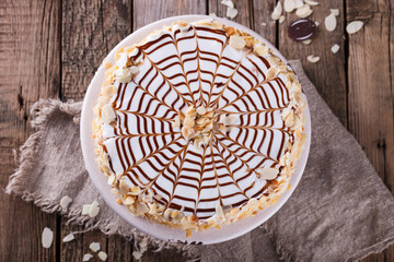  Traditional Hungarian Esterhazy cake .selective focus .Esterhazy cake with chocolate piece with a name of the cake: 