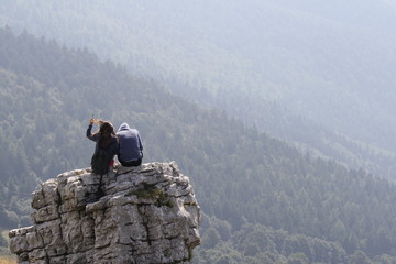 Italy, garda lake, monte baldo. Couple up the mountain

