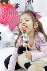 Little girl with halloween candy