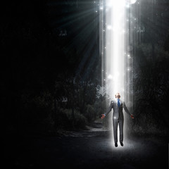 Man standing in light