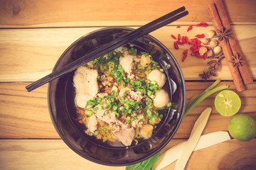 Asian style pork noodles in soup vintage color