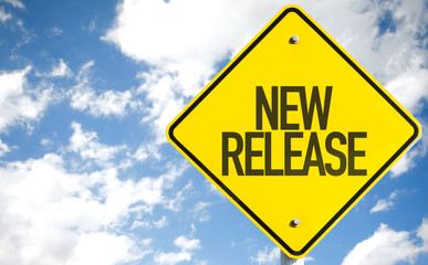 New Release sign with sky background