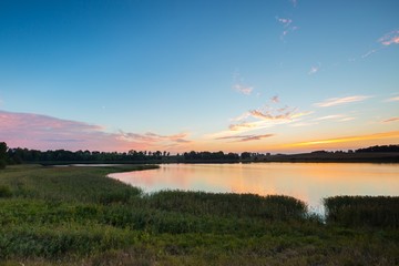 Beautiful lake landscape after sunset