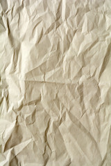 White crumpled paper for background. Brown and yellow textured grunge surface for design.