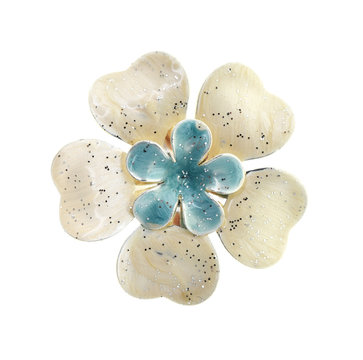 flower brooches on white background