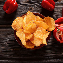 Paprika Potato Chips on rustic background