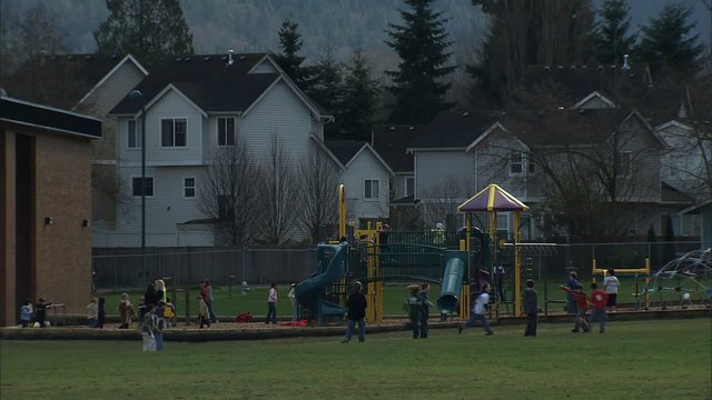 MWS kids on playground playing on toys