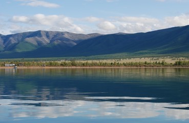 Fototapeta na wymiar Tranquil lake called the chagytai lake. The mountains are called Tannu-Ola. The Republic Of Tuva, Russia