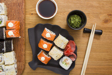 Fototapeta na wymiar Big set of sushi and rolls
