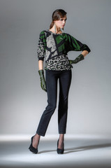 full-length portrait of a styled professional model on light background




