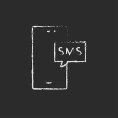 Touch screen phone with message icon drawn in chalk.