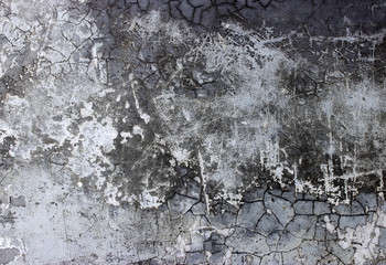 rough wall background with prominent porous patches