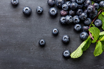 fresh blueberries on black board for background
