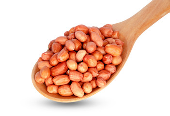 Nuts on wooden spoon isolated on white background.