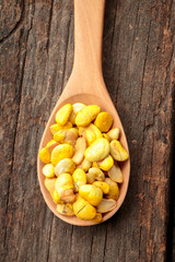 Nuts on wooden table.