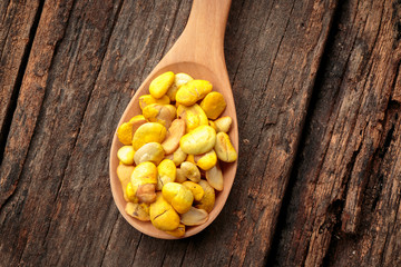 Nuts on wooden table.