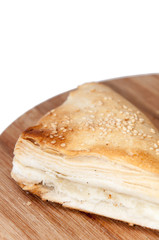Top view of puff pastry on the cutting board