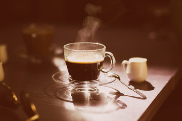 cup of hot coffee on the table