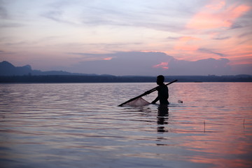 River and Silhouette Fisherman