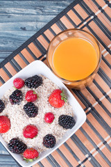 Fresh juice on wooden table 