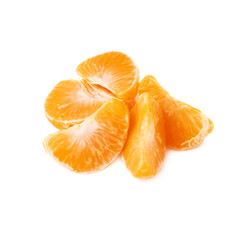 Pile of slice sections of tangerine isolated over the white
